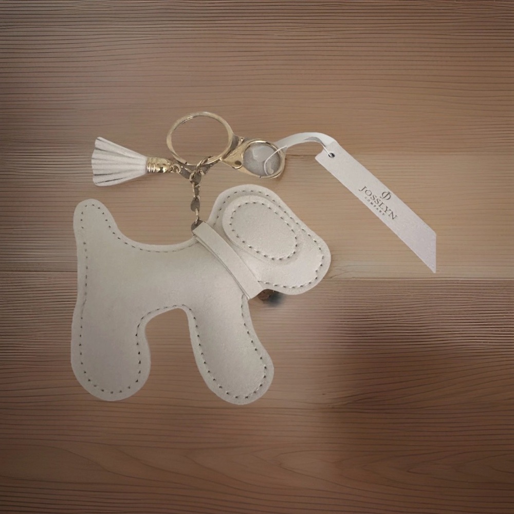 🆕 Dog-shaped White Vegan Leather Bag Charm with Gold Hardware and White Tassel